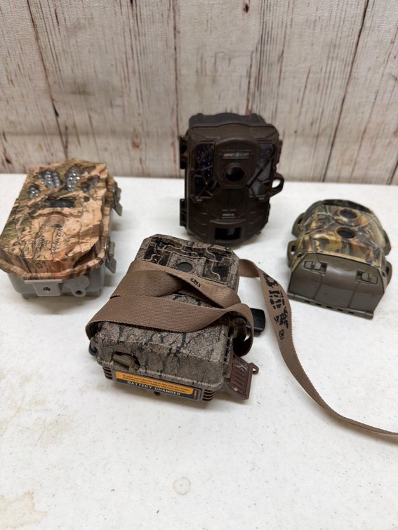 4 older trail cams
