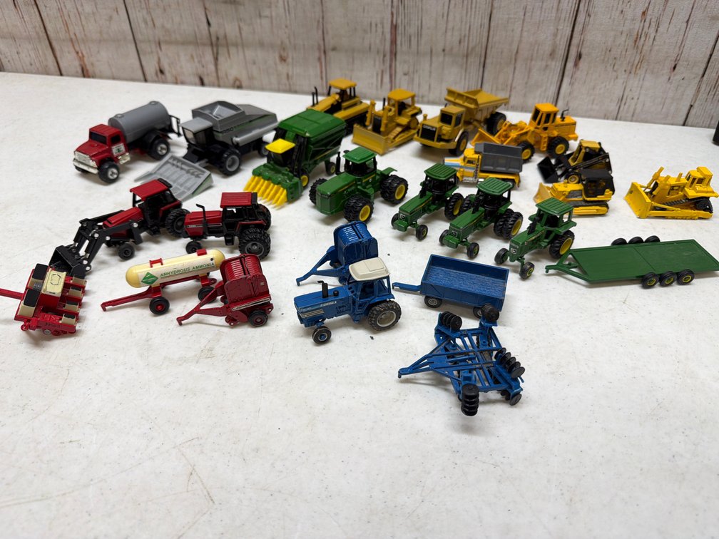 Mostly metal toy tractors matchbox size some older