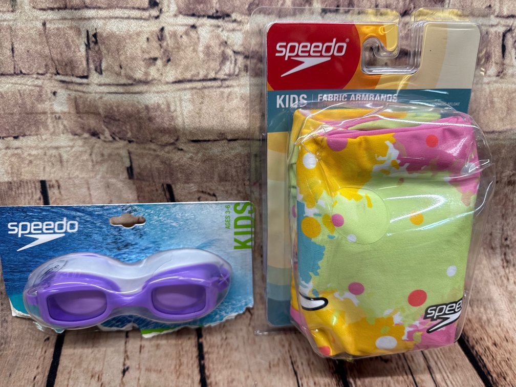 Speedo fabric arm floaties and speedo swim goggles 