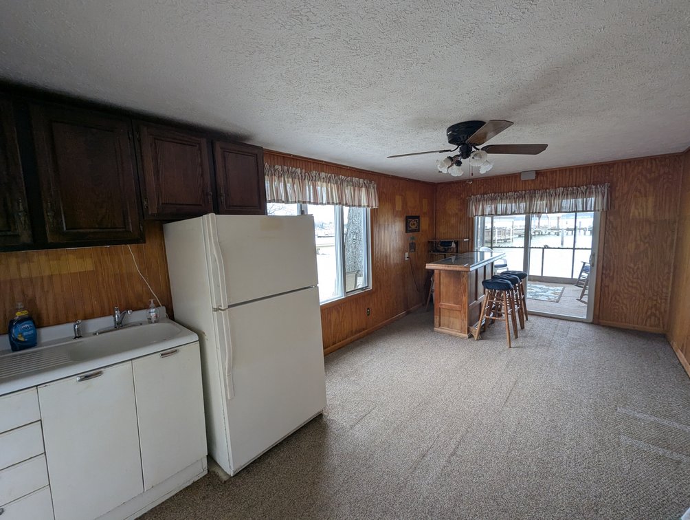 Image for LARGE WATERFRONT PROPERTY/ 2-STORY CONTEMP. HOME W/ ATT. 2-CAR GARAGE & 1-BR COTTAGE HOME/(4) PARCELS TOTALING 3.35 +/- AC SOLD IN THE ENTIRETY/ 155' FT FRONTAGE ON BUSH RIVER W SANDY BEACH/ LARGE DOCK W/ (10) +/- BOAT SLIPS, TIKI BAR & MORE!