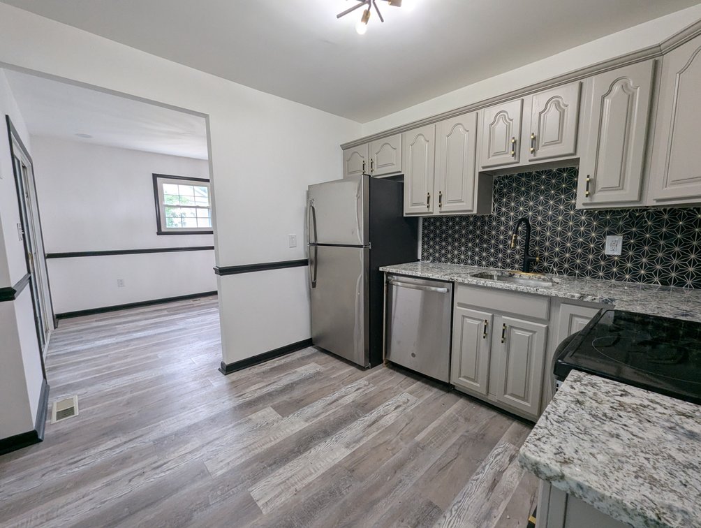 Image for TRUSTEE'S SALE OF REAL PROPERTY~MOSTLY RENOVATED BRICK & VINYL SIDED RANCHER W/ BAY WINDOW