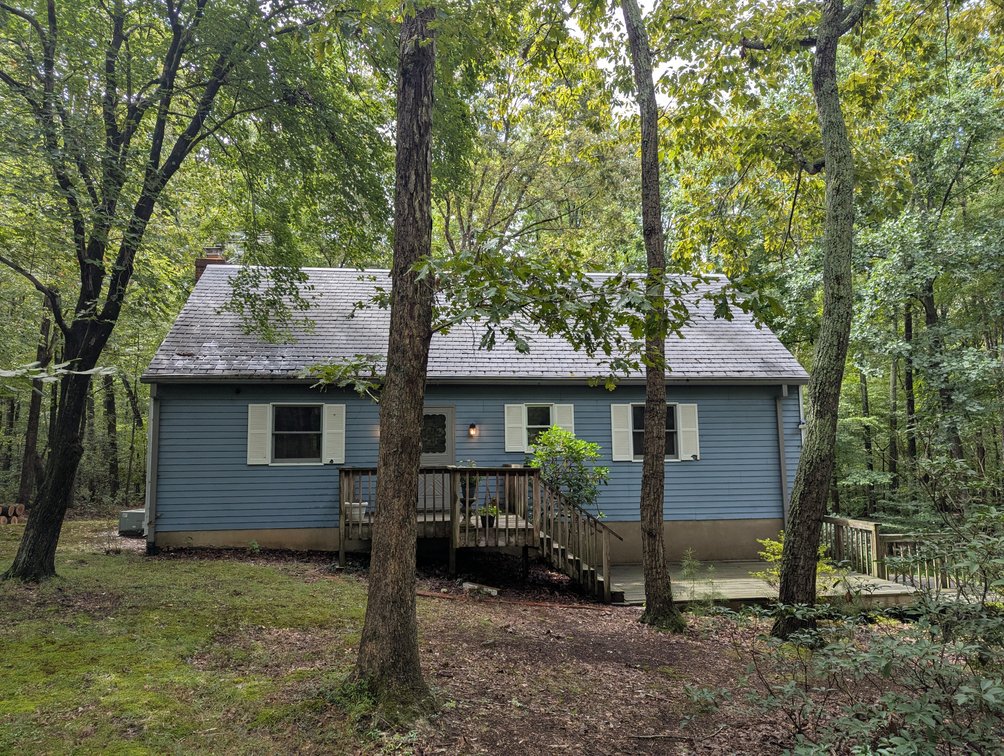 Image for 2-STORY ALUMINUM SIDED HOME W/ 2-CAR GARAGE ON 1.5 +/- ACRE PRIVATE WOODED LOT