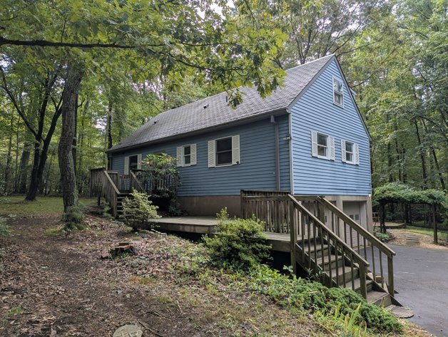 2-STORY ALUMINUM SIDED HOME W/ 2-CAR GARAGE ON 1.5 +/- ACRE PRIVATE WOODED LOT