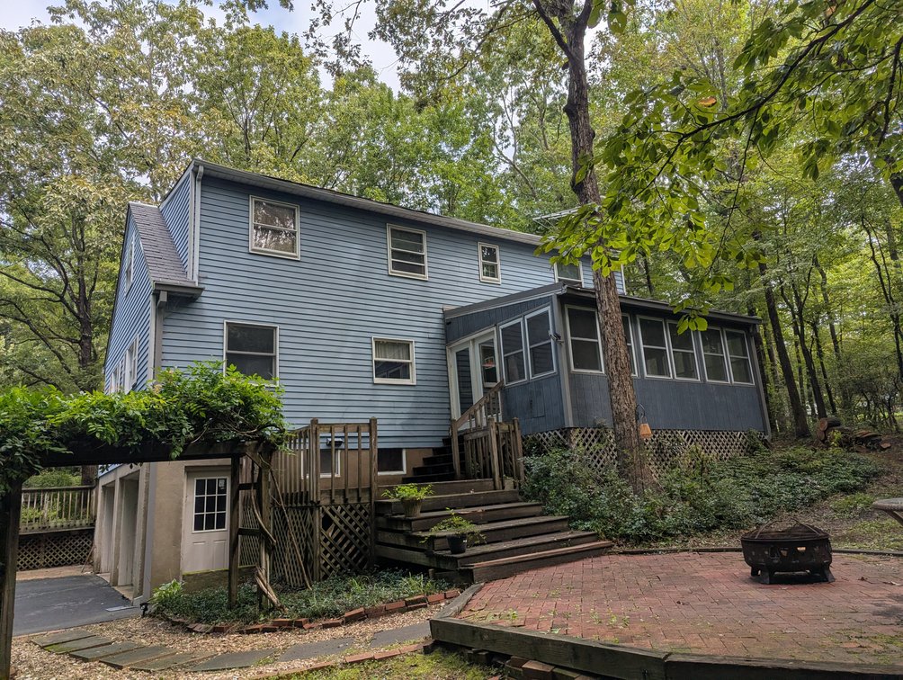 Image for 2-STORY ALUMINUM SIDED HOME W/ 2-CAR GARAGE ON 1.5 +/- ACRE PRIVATE WOODED LOT
