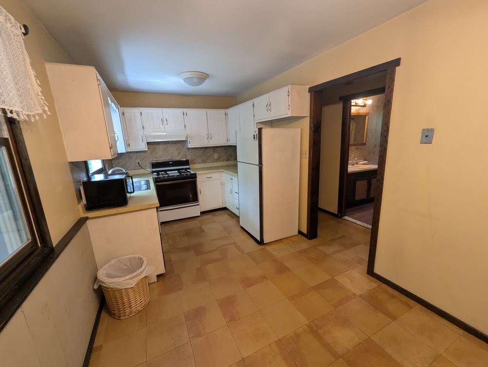 Image for 2-STORY ALUMINUM SIDED HOME W/ 2-CAR GARAGE ON 1.5 +/- ACRE PRIVATE WOODED LOT