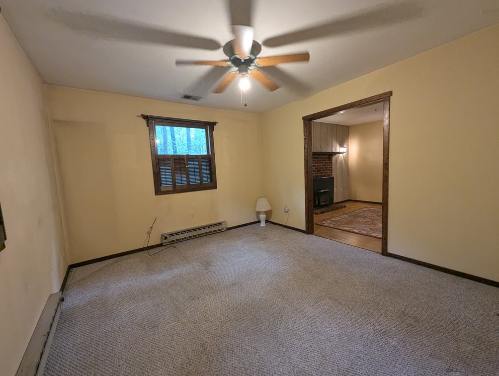 Image for 2-STORY ALUMINUM SIDED HOME W/ 2-CAR GARAGE ON 1.5 +/- ACRE PRIVATE WOODED LOT