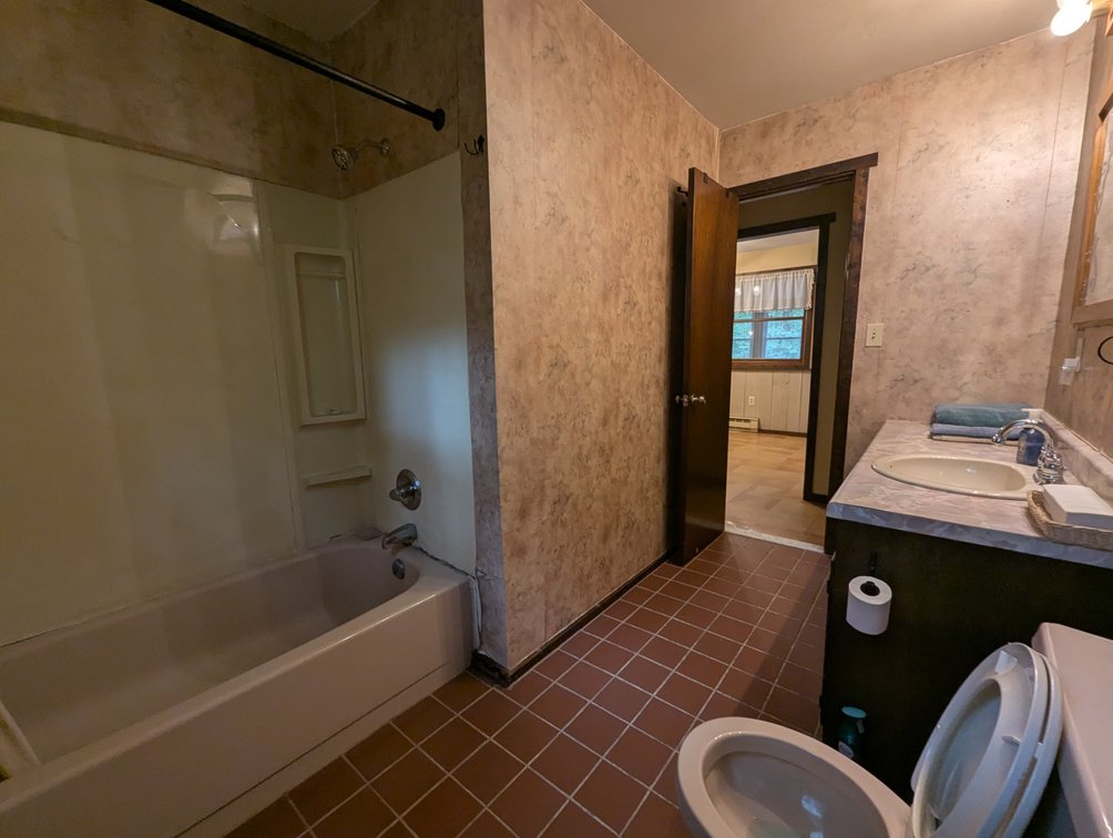 Image for 2-STORY ALUMINUM SIDED HOME W/ 2-CAR GARAGE ON 1.5 +/- ACRE PRIVATE WOODED LOT