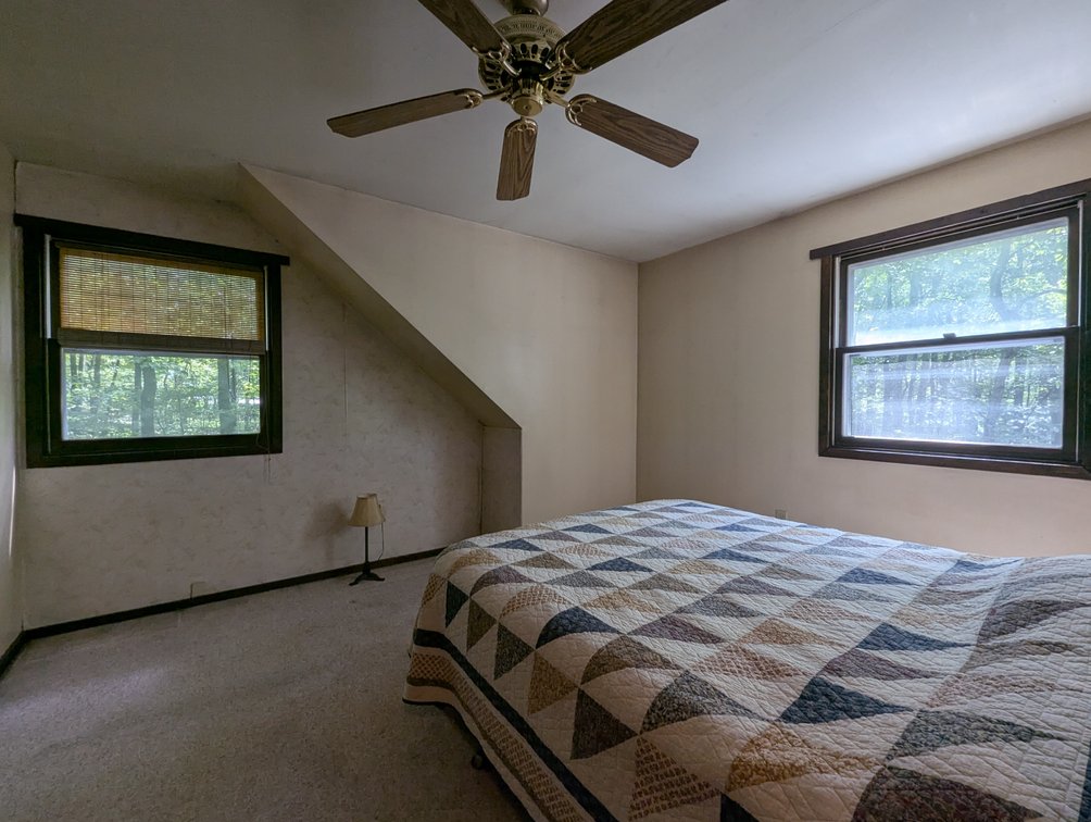 Image for 2-STORY ALUMINUM SIDED HOME W/ 2-CAR GARAGE ON 1.5 +/- ACRE PRIVATE WOODED LOT