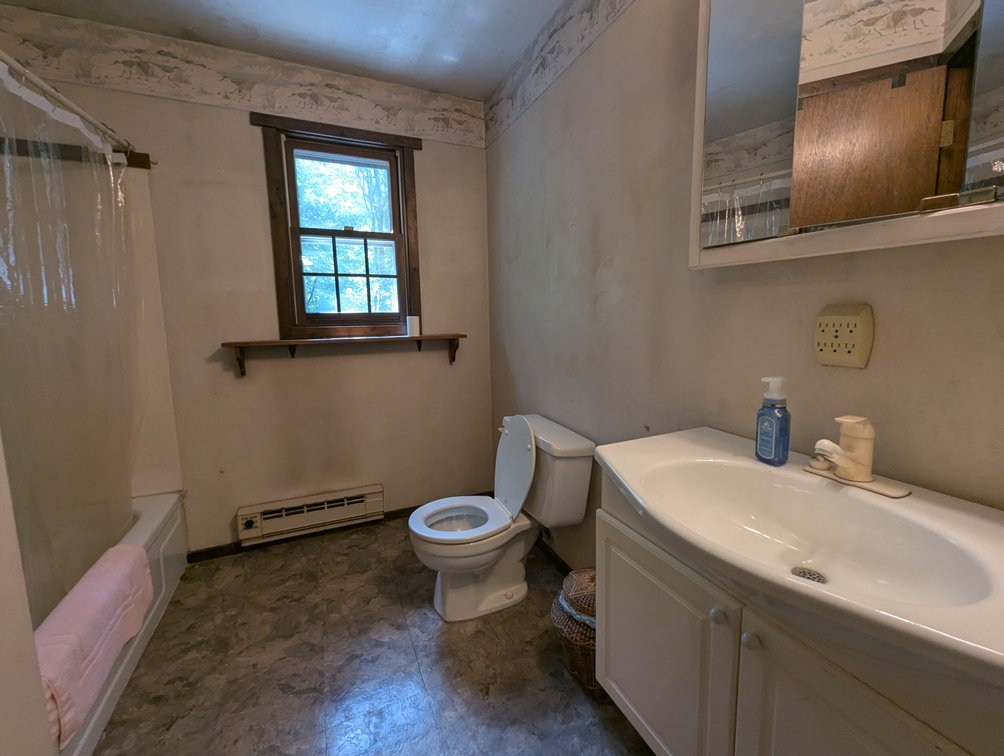 Image for 2-STORY ALUMINUM SIDED HOME W/ 2-CAR GARAGE ON 1.5 +/- ACRE PRIVATE WOODED LOT