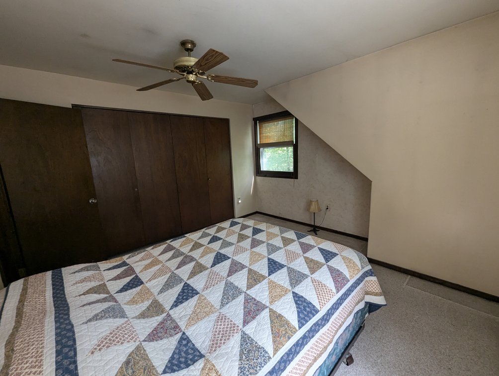 Image for 2-STORY ALUMINUM SIDED HOME W/ 2-CAR GARAGE ON 1.5 +/- ACRE PRIVATE WOODED LOT