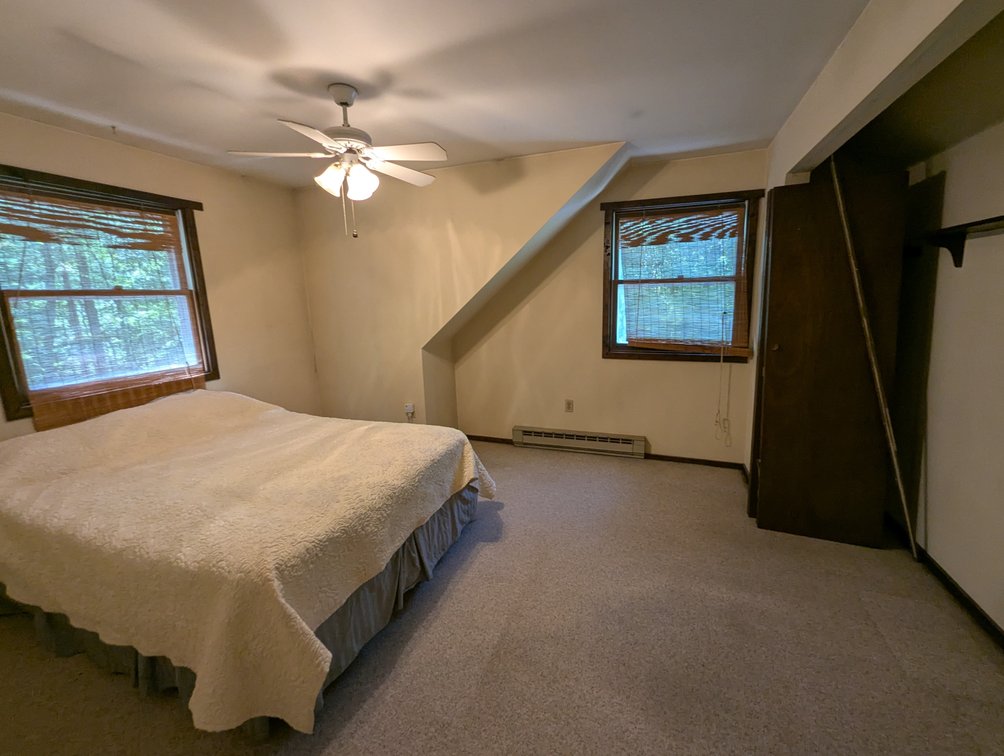 Image for 2-STORY ALUMINUM SIDED HOME W/ 2-CAR GARAGE ON 1.5 +/- ACRE PRIVATE WOODED LOT