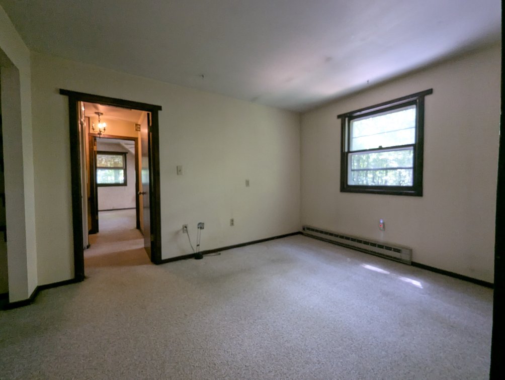Image for 2-STORY ALUMINUM SIDED HOME W/ 2-CAR GARAGE ON 1.5 +/- ACRE PRIVATE WOODED LOT