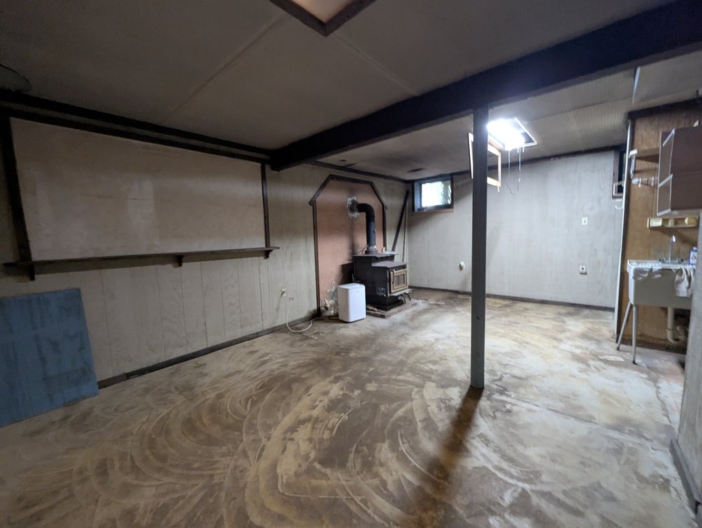 Image for 2-STORY ALUMINUM SIDED HOME W/ 2-CAR GARAGE ON 1.5 +/- ACRE PRIVATE WOODED LOT