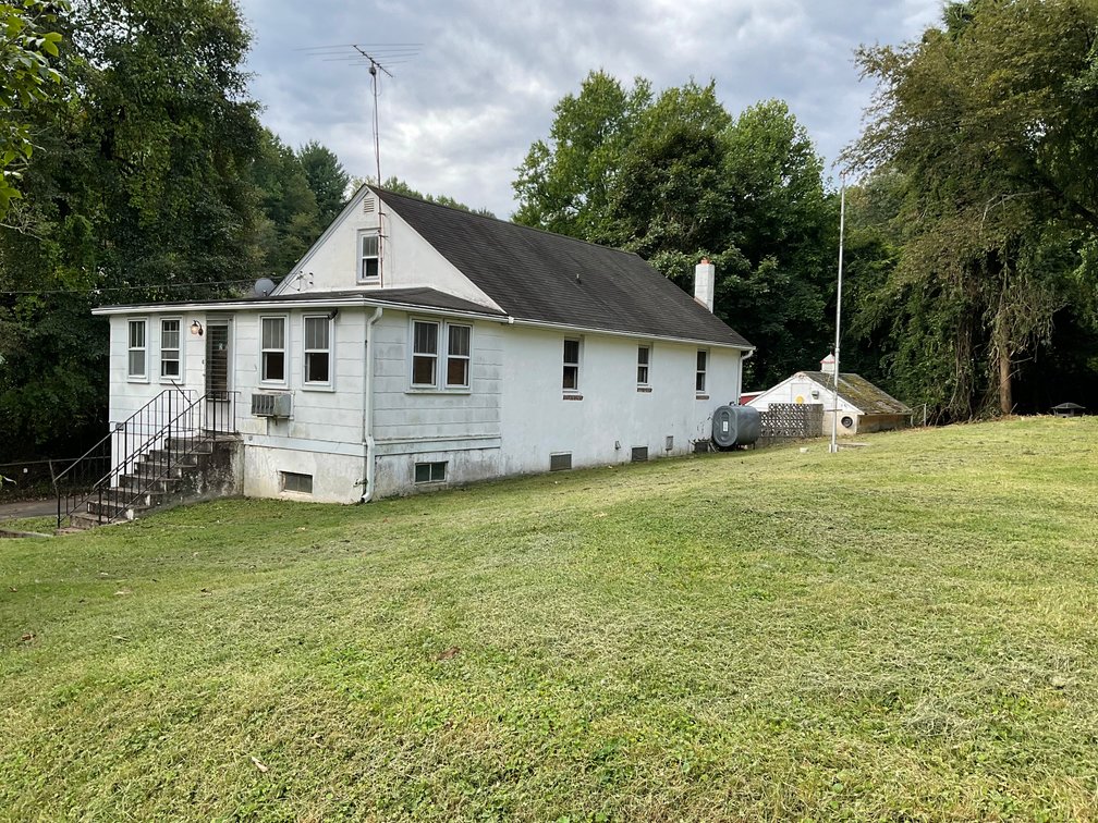 Image for ATTN: CONTRACTORS, INVESTORS, & RENOVATORS! RAISED RANCHER W/ ATT. 1-CAR GARAGE & DET. GARAGE WORKSHOP W/ HEAT ON PRIVATE .34 +/- AC LOT