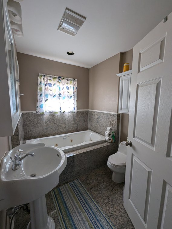 Image for 5 BR, 4 BATH WATERFRONT HOME W/ DET. 2-CAR GARAGE/ 65' +/- WATERFRONT ON LYNCH COVE W/ PIER
