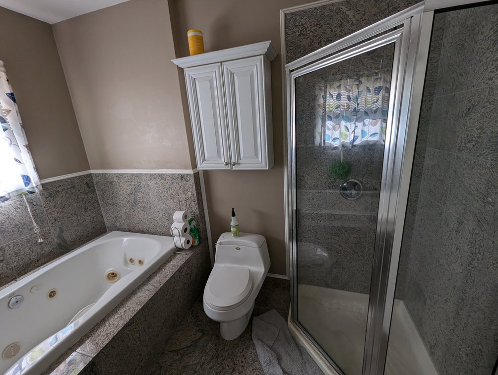 Image for 5 BR, 4 BATH WATERFRONT HOME W/ DET. 2-CAR GARAGE/ 65' +/- WATERFRONT ON LYNCH COVE W/ PIER