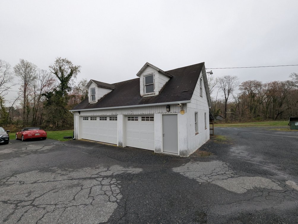 Image for 2-STORY OFFICE BLDG., 62'X40' BLOCK-FRAME SHOP, 40'X24' 3-BAY GARAGE FORMER BLEVINS HEATING & COOLING