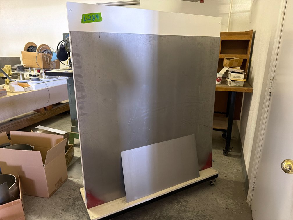 48"x15" sheet stock shelf on steel frame work w/cators