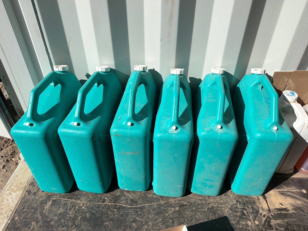 6 5 gal. water jugs
