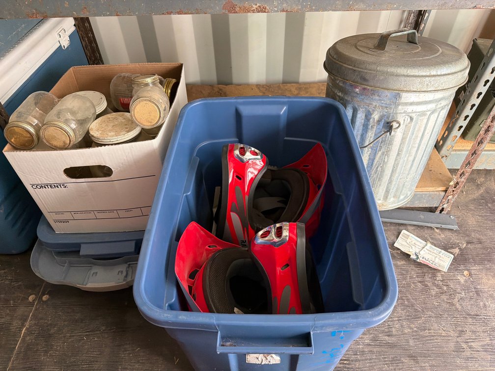 atv helmets, small trash can, canning jars