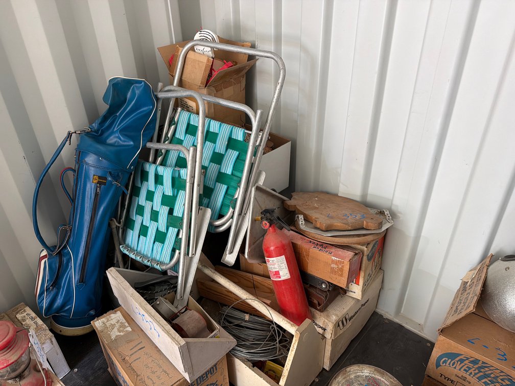 lawn chairs, golf clubs, household