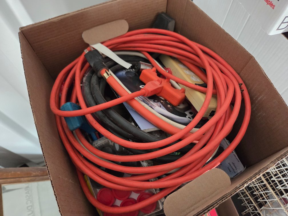 extension cords, manuals, shop supplies