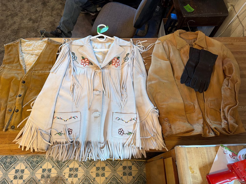 leather jackets, vest, and gloves