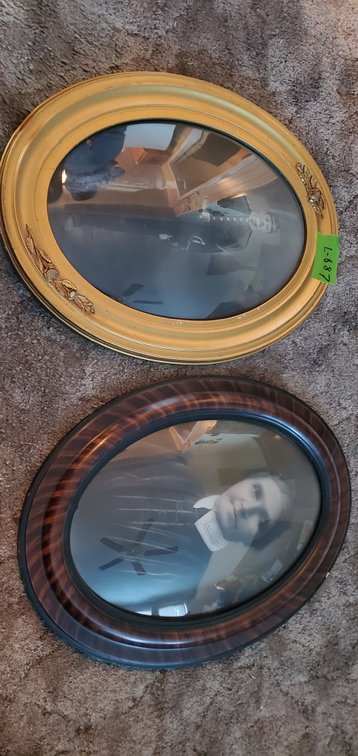 2 oval portraits