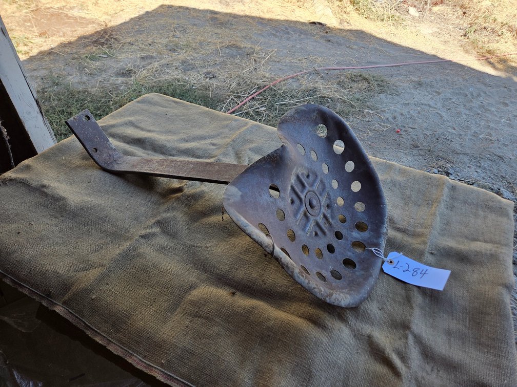 steel implement seat