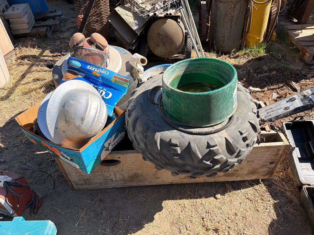 portable toilet, wood job box, water bucket