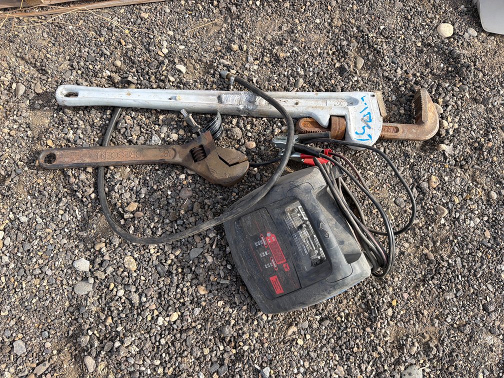 battery charger, wrenches