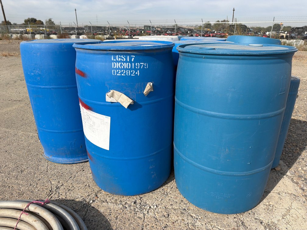 5 poly 55 gal. barrels, 1- 10 gal.