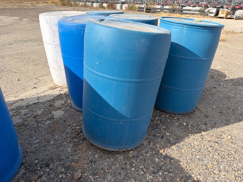6 poly 55 gal. barrels