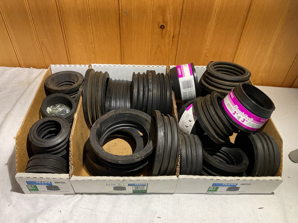 Three boxes Fernco plumbing adapters