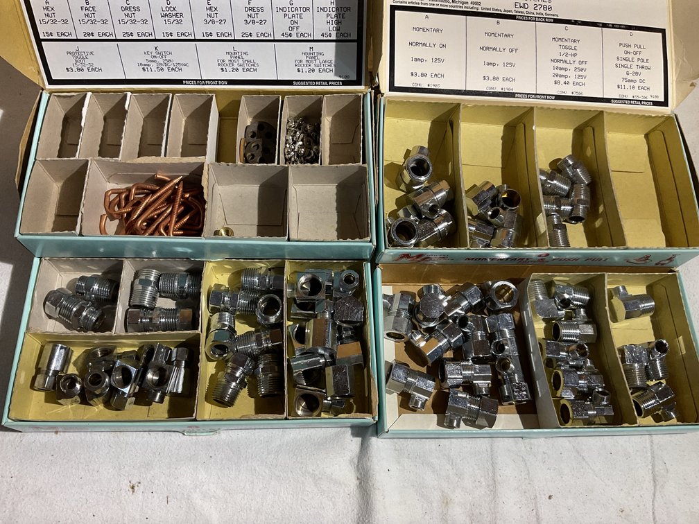 4 small boxes plumbing parts, new