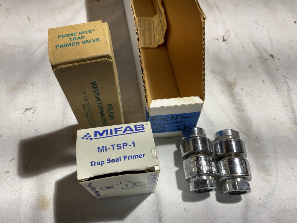 Trap seal primer and valve, backflow preventers