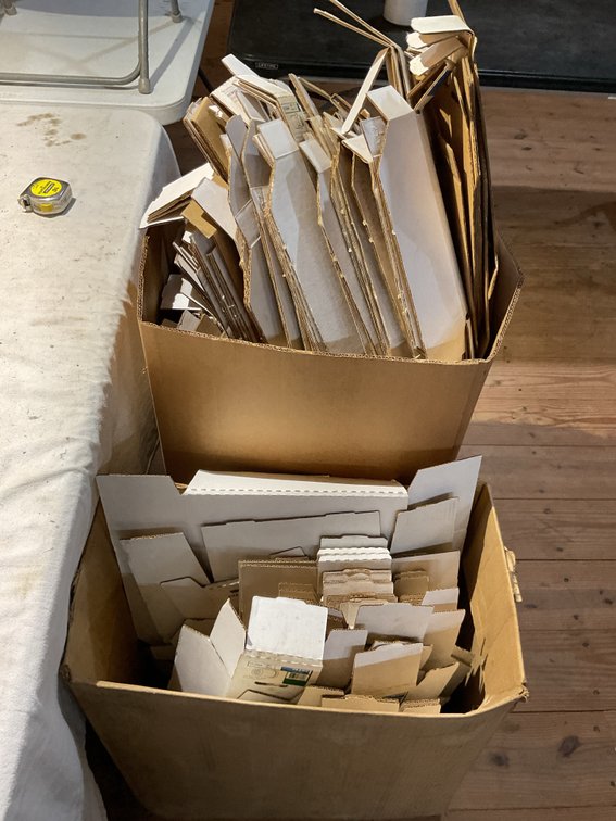 Two boxes of various sizes empty bins