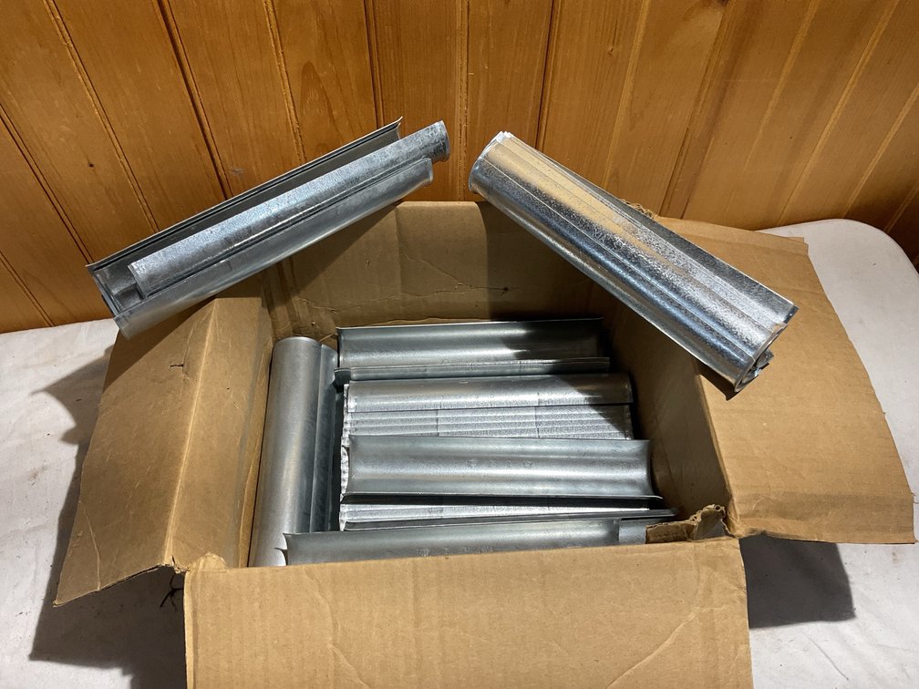 Metal guards for pipe insulation hangers