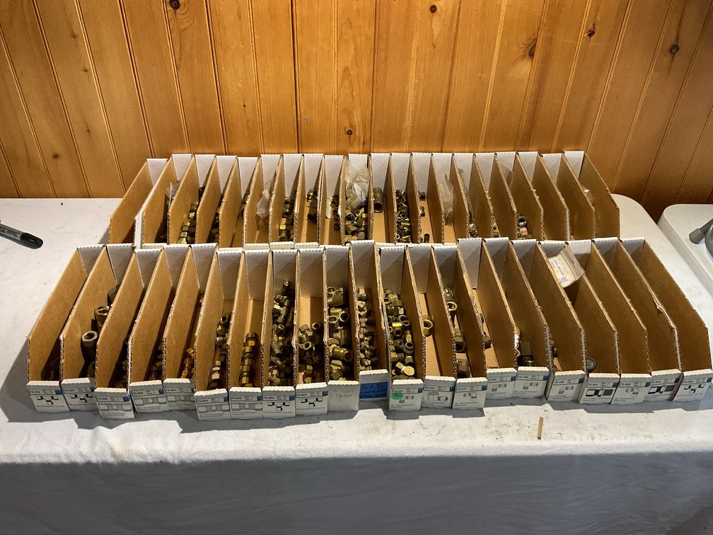 Many brass compression fittings
