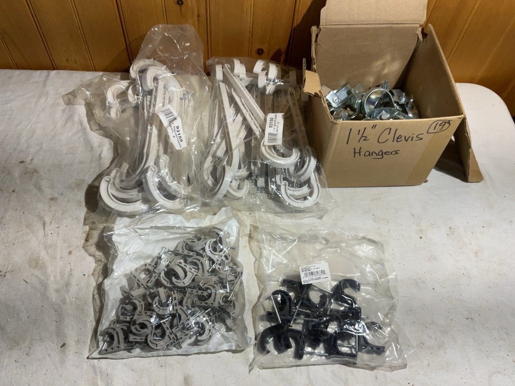 Pipe hangers and half clamps