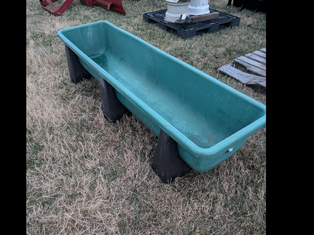 Never used 7ft high country plastic feed trough 