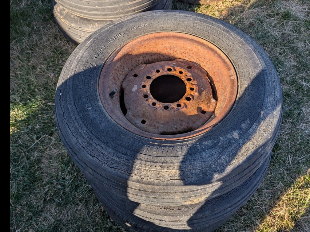 3 6.70 15 implement rims and tires 