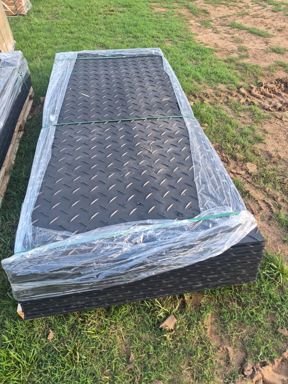 Stack of 15 ground protection mats