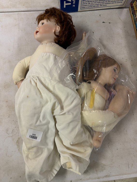Porcelain Collector Dolls and CD-RW788 CD Burner