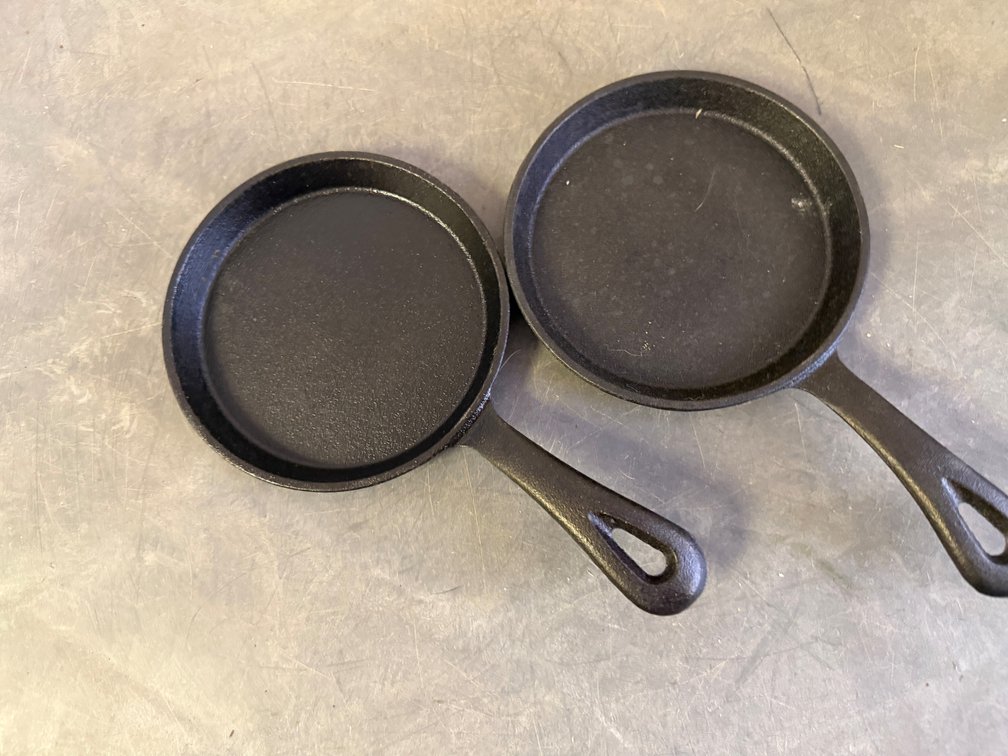 Two Miniature Cast Iron Skillets