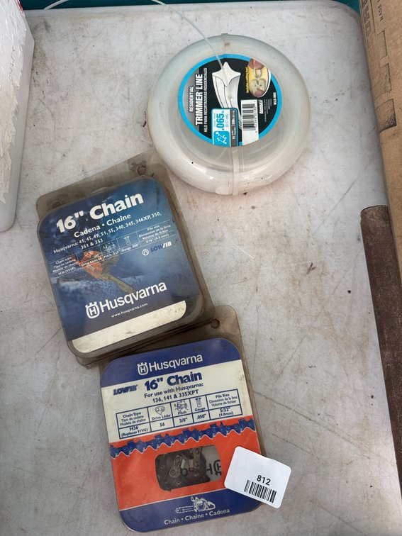Two 16 in Chainsaw Chains and Trimmer Line Spool