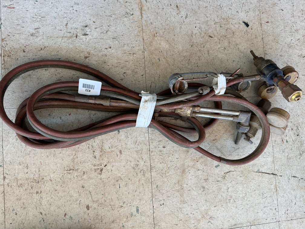Oxy-Fuel Cutting Torch Setup with Regulators and Hoses