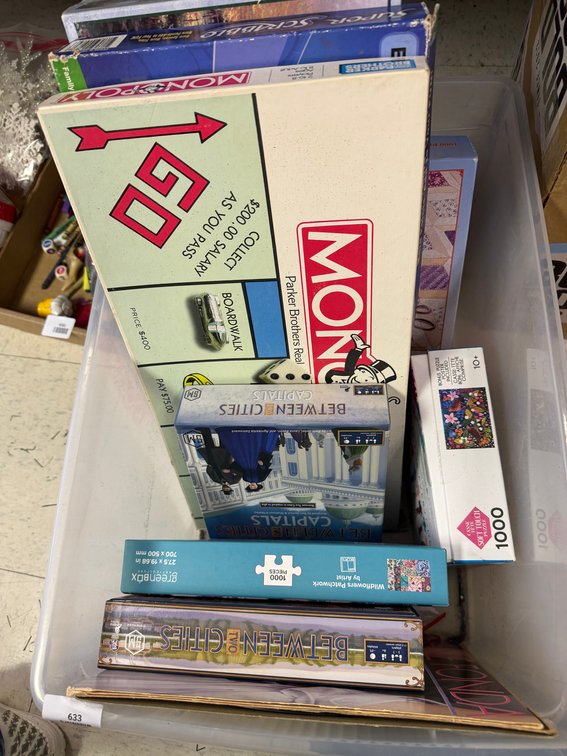 Board Games and Jigsaw Puzzles in Storage Tote
