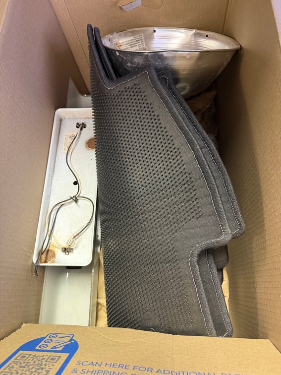 Automotive Floor Mats, Light Fixture, and Aluminum Reflector