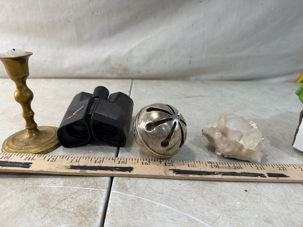 Brass Candlestick, Binoculars, Bell, and Quartz Cluster